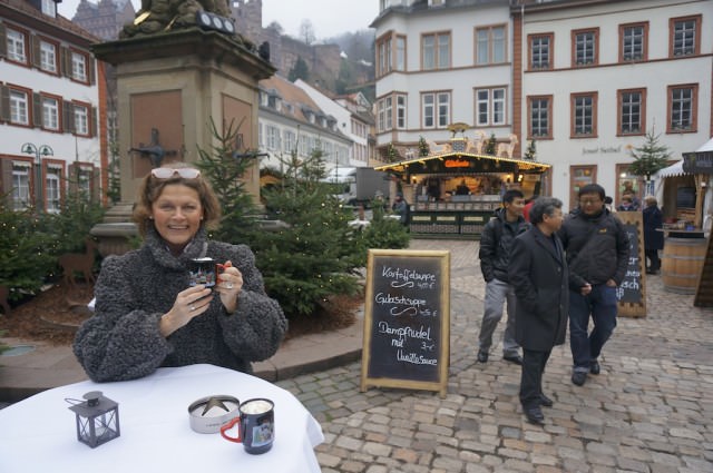 Warming up with a cup of hot chocolate at Heidelberg's Christmas Market. © 2013 Ralph Grizzle