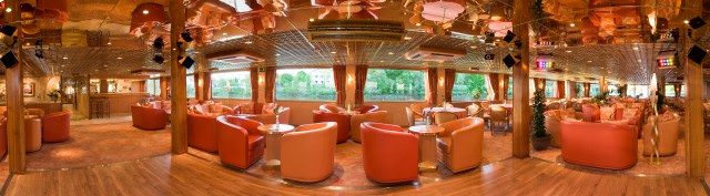 The attractive Lounge aboard L'Europe features comfortable seating and views of the passing scenery. Photo courtesy of CroisiEurope. 