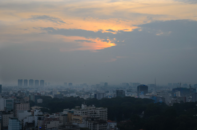 Sunset over Ho Chi Minh City, as viewed from the 23rd floor of the Sheraton Saigon. Photo © 2013 Aaron Saunders