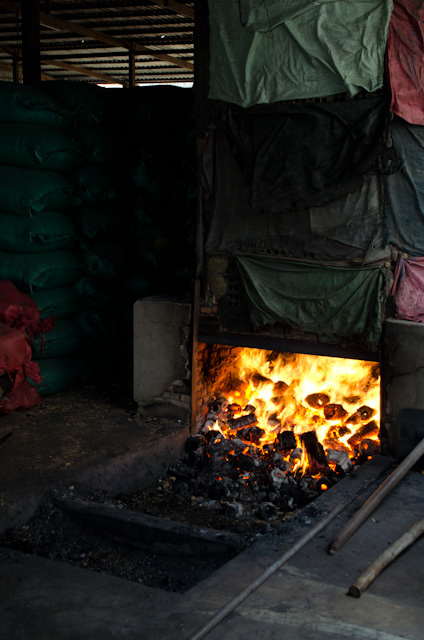 The heat coming from this local metal forge furnace was astonishing in an already-sweltering Tan Chau. Photo © 2013 Aaron Saunders
