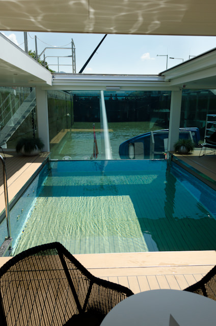The gorgeous swimming pool aboard Emerald Star. Note the opened, retractable roof. Photo © 2014 Aaron Saunders