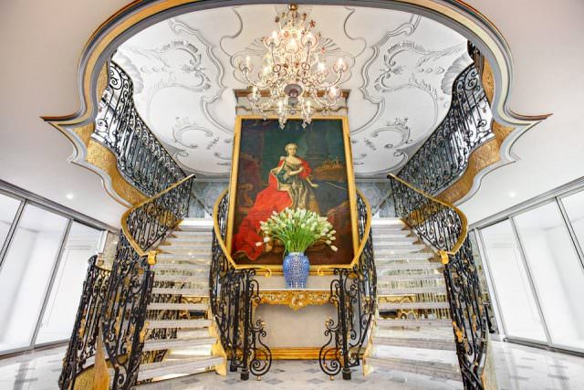 The striking atrium lobby aboard Uniworld's new S.S. Maria Theresa welcomes guests into a world of European opulence. Photo courtesy of Uniworld Boutique River Cruise Collection.