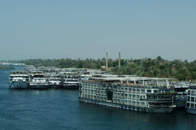 Despite the return of tourists, much of the Nile fleet is still laid-up along her banks. Photo © 2015 Aaron Saunders