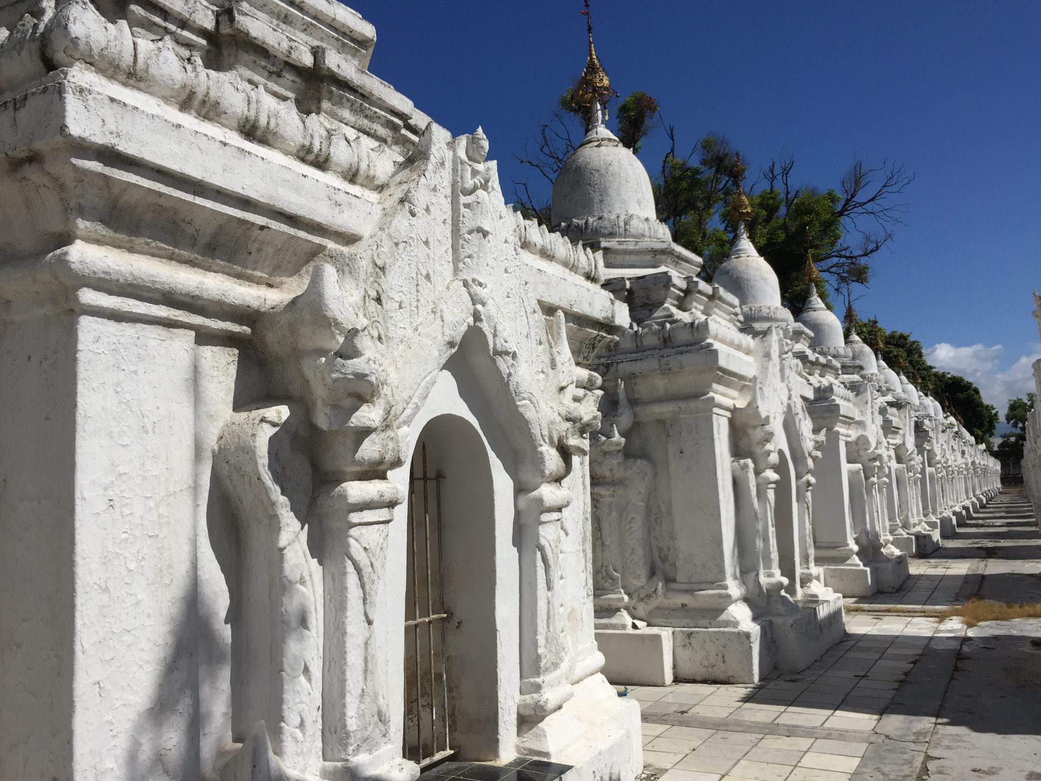 Row after row after row of stupas housing individual book pages at the Kuthodaw Pagoda complex. © 2015 Gail Jessen
