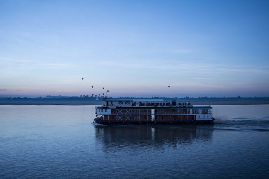 Another Pandaw river cruise ship passes us - at a very photographic moment! Photo © 2015 Aaron Saunders
