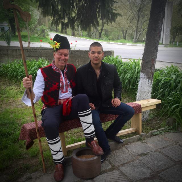 I got a chance to try on a Bulgarian costume. Seated with 17-year-old Deyan who translated for me and showed me around Alfatar. © 2016 Ralph Grizzle