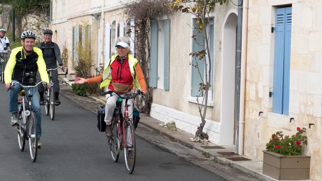 Our guide, right, with my friend and colleague Mike Louagie, while riding from Blaye to Bourg. © 2016 Ralph Grizzle